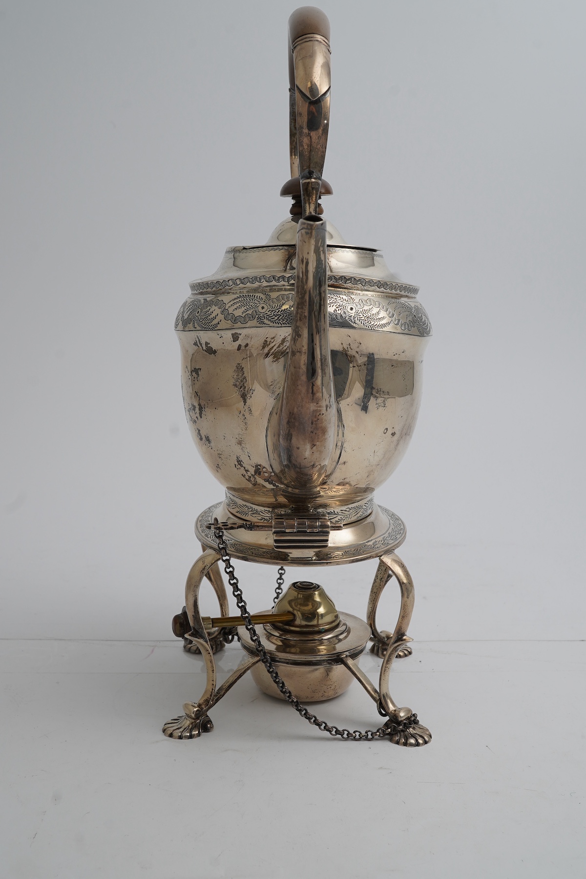A George V silver oval tea kettle on stand with plated burner, Crichton Brothers